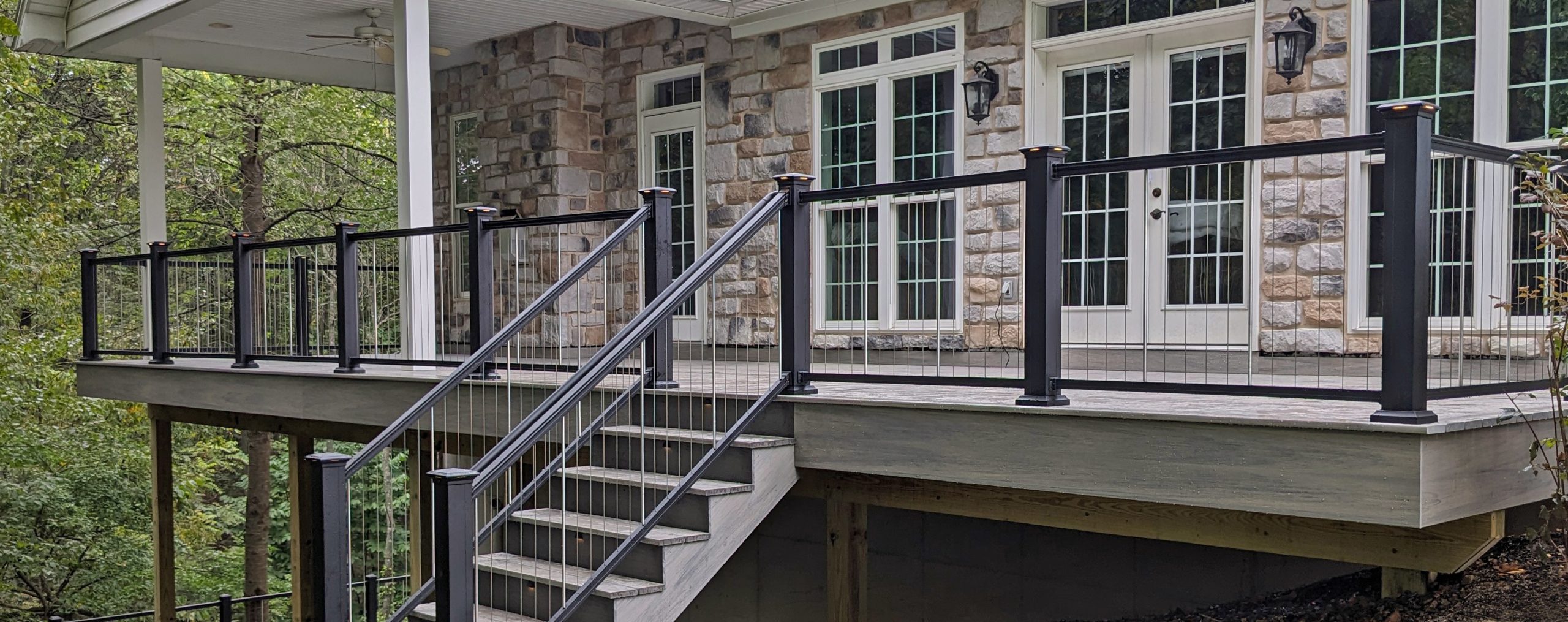 stairs leading to a vinyl deck